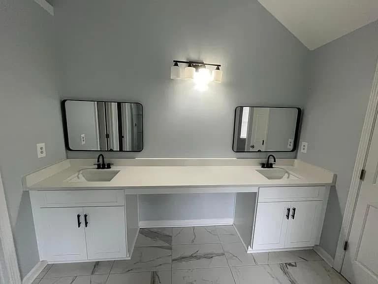 Bathroom double vanity with gray walls