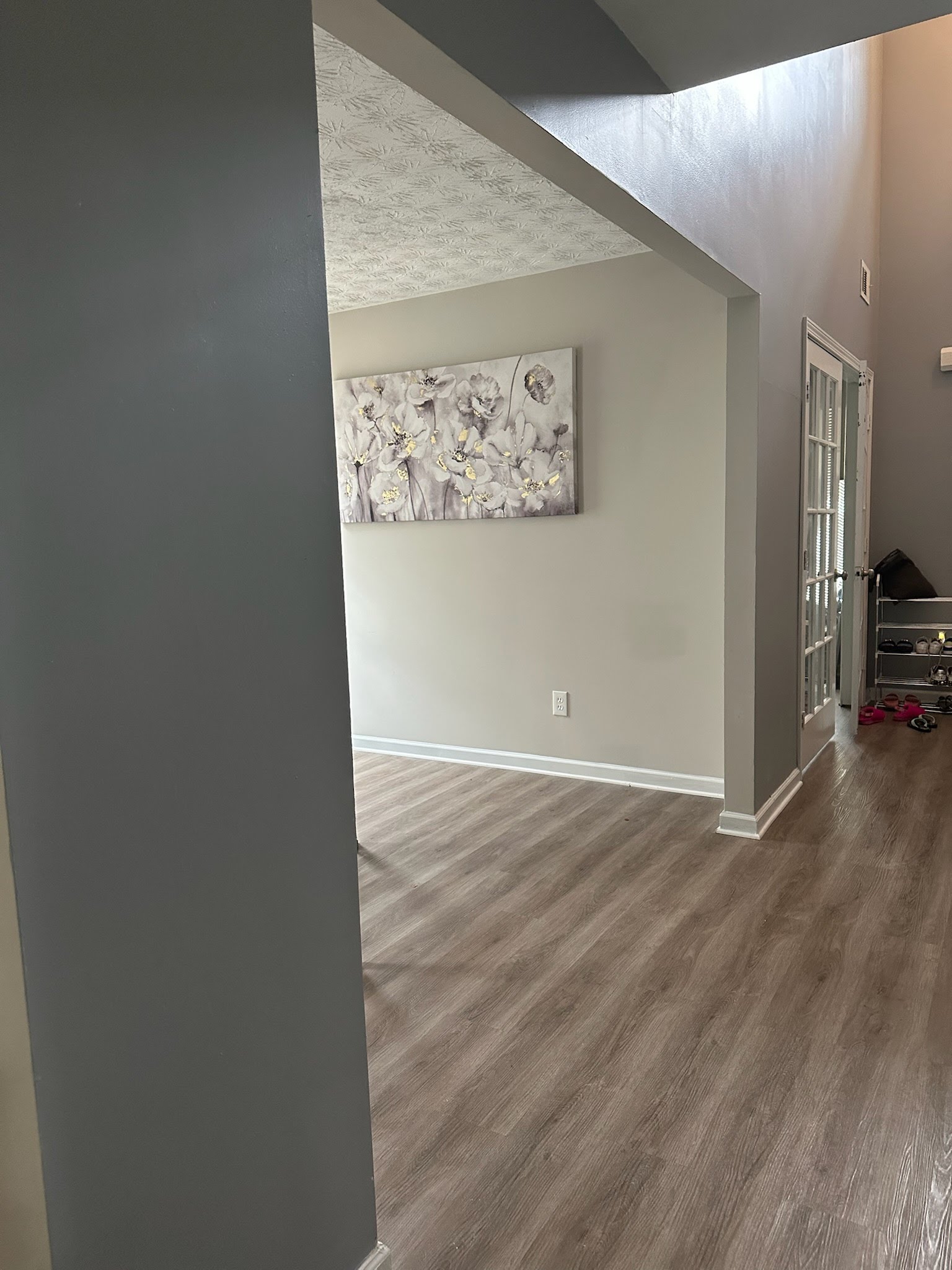Gray entry with wood-look flooring