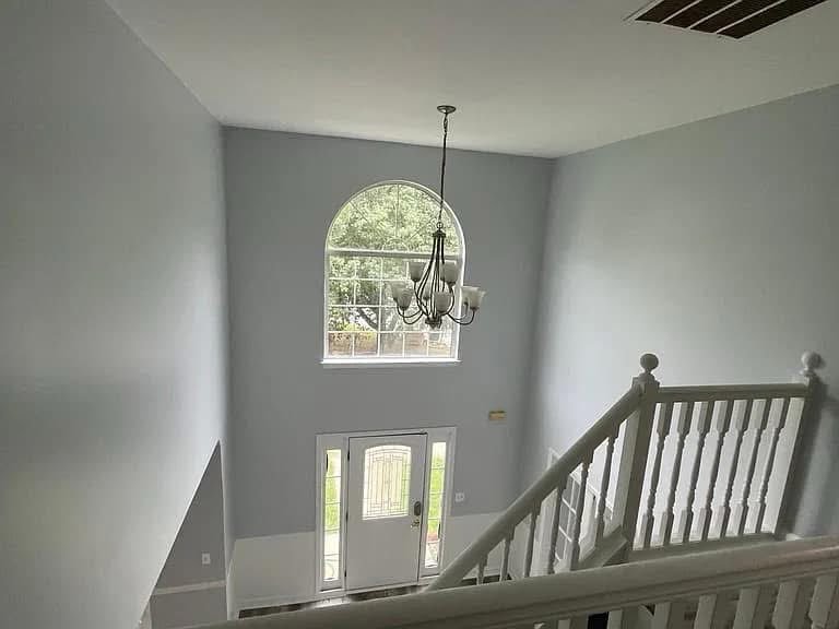 Gray foyer with staircase