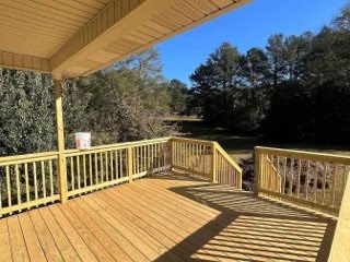Outdoor wood deck and railing